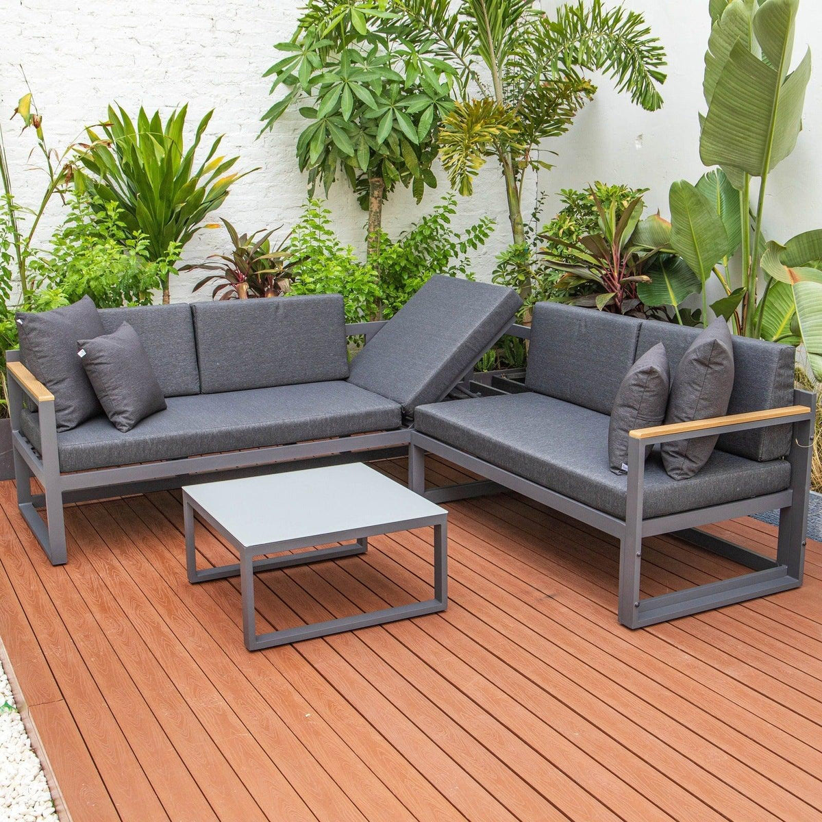 Chelsea Black Sectional With Adjustable Headrest & Coffee Table With Cushions - Elax Furniture