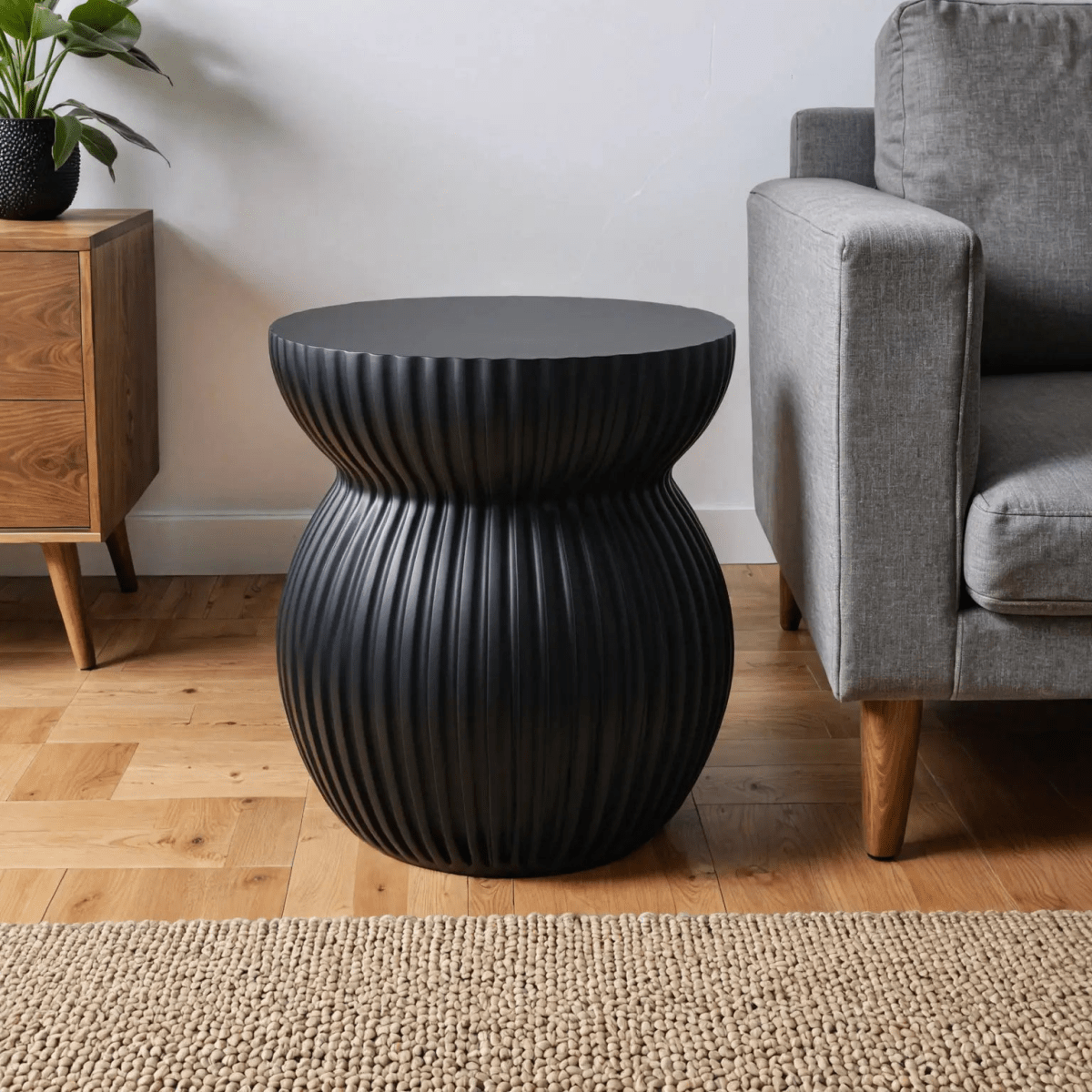 Mander Fiberstone Side Table with Ribbed Hourglass Design for Indoor and Outdoor Black Side Table Leisuremod