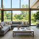 Sleek modern living room showcasing proper coffee table height relative to a sofa seat cushion