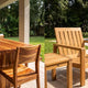 Side-by-side comparison of acacia and teak outdoor furniture on a patio