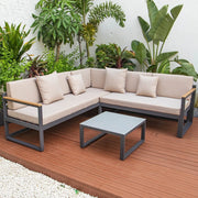 Chelsea Black Sectional With Adjustable Headrest & Coffee Table With Cushions - Elax Furniture