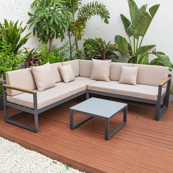 Chelsea Black Sectional With Adjustable Headrest & Coffee Table With Cushions