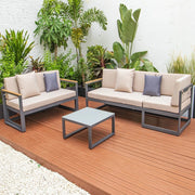 Chelsea Black Sectional With Adjustable Headrest & Coffee Table With Two Tone Cushions - Elax Furniture