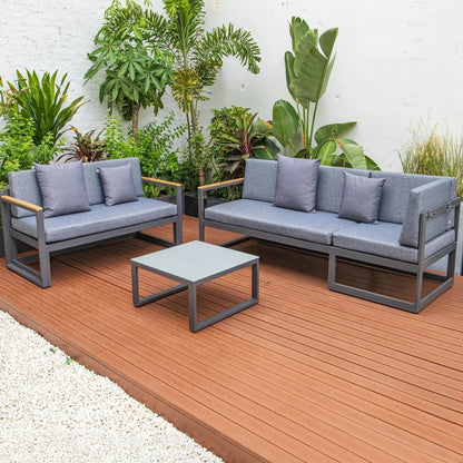 Chelsea Black Sectional With Adjustable Headrest & Coffee Table With Cushions - Elax Furniture