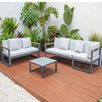 Chelsea Black Sectional With Adjustable Headrest & Coffee Table With Cushions - Elax Furniture
