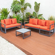 Chelsea Black Sectional With Adjustable Headrest & Coffee Table With Cushions - Elax Furniture