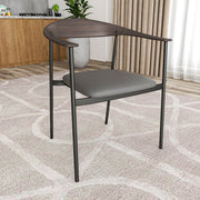 Kora Dining Chair Upholstered in Leather with Stainless Steel Frame and Legs Charcoal Dining Chair Leisuremod
