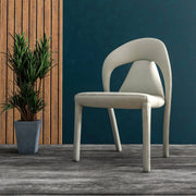 Solace Series Dining Chair Upholstered in Leather with Steel Legs and an Open Back Design - Elax Furniture